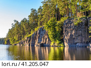 Steep rocky coast of the island of Valaam. Evening light. Square frame. Стоковое фото, фотограф Михаил Аккуратoв / Фотобанк Лори