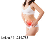 Woman with abdominal pain, stomachache isolated on white background. Стоковое фото, фотограф Станислав Тарко / Фотобанк Лори