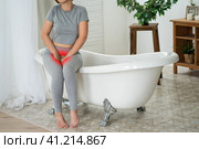 Menstrual pain, woman with stomachache suffering at home. Стоковое фото, фотограф Станислав Тарко / Фотобанк Лори