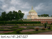 View of the side East Pavilion (Japanese Pavilion) of the Great (Menshikov) Palace in the Oranienbaum Palace and Park Ensemble on a sunny summer day, Lomonosov, Saint Petersburg, Russia. Редакционное фото, фотограф Ula Ulachka / Фотобанк Лори