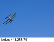 The spraying of fertilizers and pesticides on the field with the aircraft. Стоковое фото, фотограф Леонид Еремейчук / Фотобанк Лори