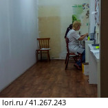Krasnodar, Russia - November 10, 2017: Doctors in the registry of the polyclinic. Russian hospital. Редакционное фото, фотограф Леонид Еремейчук / Фотобанк Лори