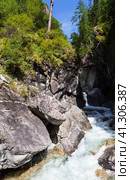 View of waterfall on mountain river Kyngarga at village Arshan in Tunka valley. Many tourists climb mountains to admire beautiful cascade of waterfalls. Summer activity outdoorsl. Siberia. Buryatia. Arshan resort. Стоковое фото, фотограф Виктория Катьянова / Фотобанк Лори