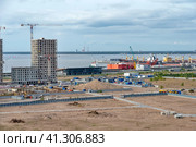 Строительство на намывных территориях Васильевского острова в Санкт-Петербурге (2023 год). Редакционное фото, фотограф Румянцева Наталия / Фотобанк Лори