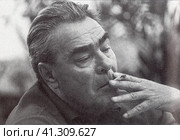 Леонид Ильич Брежнев (1906-1982), советский государственный, политический и партийный деятель, занимавший высшую руководящую должность в КПСС в течение 18 лет. Ретро фото, середина 70-х годов ХХ века. Редакционное фото, фотограф Сергей Елизарьев / Фотобанк Лори