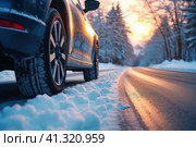 Car's wheels on slippery road covered with snow. Danger on winter trip. Generative AI. Стоковое AI-изображение, AI-художник Светлана Лажко / Фотобанк Лори