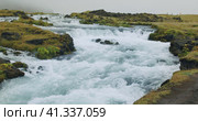 Cascades of Foss waterfall with blue water in Iceland. Стоковое видео, видеограф Igor Tichonow / Фотобанк Лори