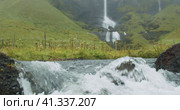 Foss a Sidu Waterfall in foggy weather near Kirkjubaejarklaustur, Iceland. Стоковое видео, видеограф Igor Tichonow / Фотобанк Лори