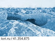Старая минометная мина времен второй мировой войны. War echo in the Crimean mountains near the city of Sevastopol. Стоковое фото, фотограф Татьяна Д / Фотобанк Лори
