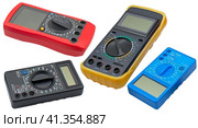 Цифровые мультиметры разного типа на белом фоне. Digital  multimeters on a white. Стоковое фото, фотограф Татьяна Д / Фотобанк Лори