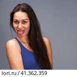 Closeup on mouth of females face, showing tongue. Стоковое фото, фотограф Андрей Аркуша / Фотобанк Лори