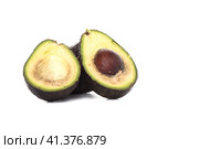 Two Haas Avocado Fruits Isolated Over White Background. Стоковое фото, фотограф Сергей Долгов / Фотобанк Лори