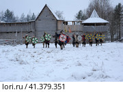The festival is a historical reconstruction of the Viking Age in winter. Vikings attack with shields and helmets (2014 год). Редакционное фото, фотограф Анна Кривицкая / Фотобанк Лори