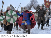 The festival is a historical reconstruction of the Viking Age in winter. Vikings attack with shields and helmets (2014 год). Редакционное фото, фотограф Анна Кривицкая / Фотобанк Лори
