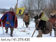 The festival is a historical reconstruction of the Viking Age in winter. Vikings attack with shields and helmets (2014 год). Редакционное фото, фотограф Анна Кривицкая / Фотобанк Лори