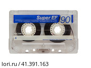 A ninety-minute Sony audio cassette in a transparent plastic case, isolated on a white background (2021 год). Редакционное фото, фотограф Воловодов Владимир / Фотобанк Лори