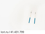 Презервативы и положительный тест на беременность. Condoms and a positive pregnancy test. Стоковое фото, фотограф Ольга Митряева / Фотобанк Лори