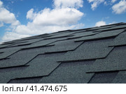 Soft roof, flexible shingles. Installation of soft tiles on the roof. Стоковое фото, фотограф Александр Поташев / Фотобанк Лори