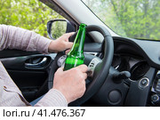 An alcoholic driving a car. Стоковое фото, фотограф Александр Палехов / Фотобанк Лори