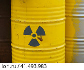 Photography of barrel of chemical weapons. Painted picture. Green panted sign of danger. Стоковое фото, фотограф YuryKara / Фотобанк Лори