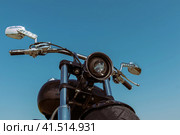The front of the motorcycle from bottom to top under a blue sky. Стоковое фото, фотограф Долотова Елена Викторовна / Фотобанк Лори