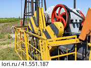 Electric drive and reducer pumping unit of an oil well. Стоковое фото, фотограф Леонид Еремейчук / Фотобанк Лори