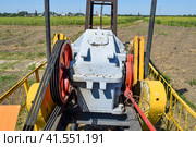 Electric drive and reducer pumping unit of an oil well. Стоковое фото, фотограф Леонид Еремейчук / Фотобанк Лори