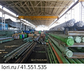 Pipe storage for the oil industry. Submersible electric motors. Barrels with reagent. Стоковое фото, фотограф Леонид Еремейчук / Фотобанк Лори