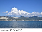 Sea bay landscape Tsemess. Mountains and clouds in the sky. In the distance can be seen the Marine cargo port. Стоковое фото, фотограф Леонид Еремейчук / Фотобанк Лори