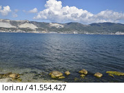 Sea bay landscape Tsemess. Mountains and clouds in the sky. In the distance can be seen the Marine cargo port. Стоковое фото, фотограф Леонид Еремейчук / Фотобанк Лори