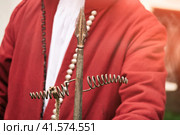 A male gunner in a vintage Swedish military uniform with a ramrod in his hands. Reconstruction of the events of the Russian-Swedish War. Стоковое фото, фотограф Андрей Журавлев / Фотобанк Лори