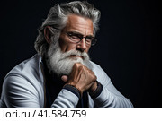 Portrait of an elderly man with a large gray beard and lush hair on his head with a thoughtful look. Dark background.Generated by AI. Стоковое AI-изображение, AI-художник Ярославский Максим / Фотобанк Лори