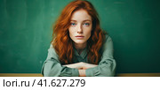 A young teenage girl looks straight into the camera with a solid light green background. The concept of the beauty of youth. Generated by artificial intelligence. Стоковое AI-изображение, AI-художник Ярославский Максим / Фотобанк Лори
