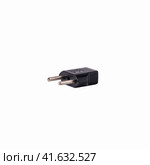 2-pin EU to US plug type Converter black Plastic element isolated on a white background. Close up. Стоковое фото, фотограф Воловодов Владимир / Фотобанк Лори