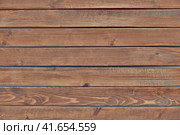 The texture of the varnished wooden boards of brown color. Стоковое фото, фотограф Андрей Журавлев / Фотобанк Лори
