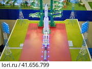 Model of a space rocket Angara ready to take off at the launch pad of the cosmodrome. Exhibition Days of the far East - Moscow, Russia, 12 13 2019. Редакционное фото, фотограф Андрей Журавлев / Фотобанк Лори