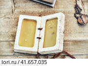 Retro notebook made of wax. Wooden table for writing. Vintage plate for the manuscript. Стоковое фото, фотограф Андрей Журавлев / Фотобанк Лори
