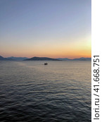 Beautiful sunset at the seaside, Greece. Редакционное фото, фотограф Екатерина Каляева / Фотобанк Лори