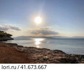 Beautiful sunset at the seaside, Greece. Редакционное фото, фотограф Екатерина Каляева / Фотобанк Лори