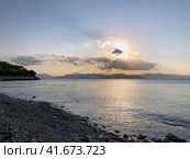 Beautiful sunset at the seaside, Greece. Редакционное фото, фотограф Екатерина Каляева / Фотобанк Лори