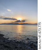 Beautiful sunset at the seaside, Greece. Редакционное фото, фотограф Екатерина Каляева / Фотобанк Лори