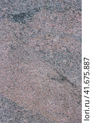 Granite texture. Natural pink granite with a grainy pattern. Stone background. Solid rough surface of rock. Durable construction and decoration material. Close-up. Стоковое фото, фотограф Андрей Степанов / Фотобанк Лори