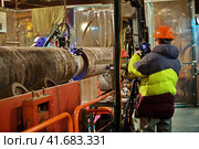 Photographing of welding of the pipeline in shop. Стоковое фото, фотограф Леонид Еремейчук / Фотобанк Лори