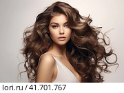 Portrait of a beautiful brunette with long wavy hair on a dark background. Generated by AI. Стоковое AI-изображение, AI-художник Ярославский Максим / Фотобанк Лори