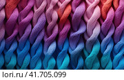 abstract background with a close-up image of a multi-colored knitted product. Стоковое AI-изображение, AI-художник Margarita Davchenko / Фотобанк Лори