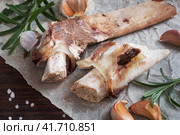 Beef bone and vegetable ingredients for cooking broth. Healthy food with collagen and amino acids. Copy space. Стоковое фото, фотограф Глущенко Елена / Фотобанк Лори