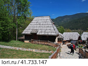 Drvengrad, Serbia - 27 Apr 2018: Drvengrad is traditional Serbian village in the Balkan mountains. Редакционное фото, фотограф Сергей Стрелков / Фотобанк Лори