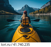 A girl on a yellow canoe is sailing on a mountain lake in calm weather. T Generated by AI. Стоковое AI-изображение, AI-художник Ярославский Максим / Фотобанк Лори