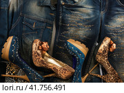 Beautiful background of jeans, jackets and shoes with crystals. Стоковое фото, фотограф Александр Собко / Фотобанк Лори