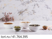 Balance female hormones with pumpkin, flax, sesame and sunflower seeds. Стоковое фото, фотограф Елена Руй / Фотобанк Лори